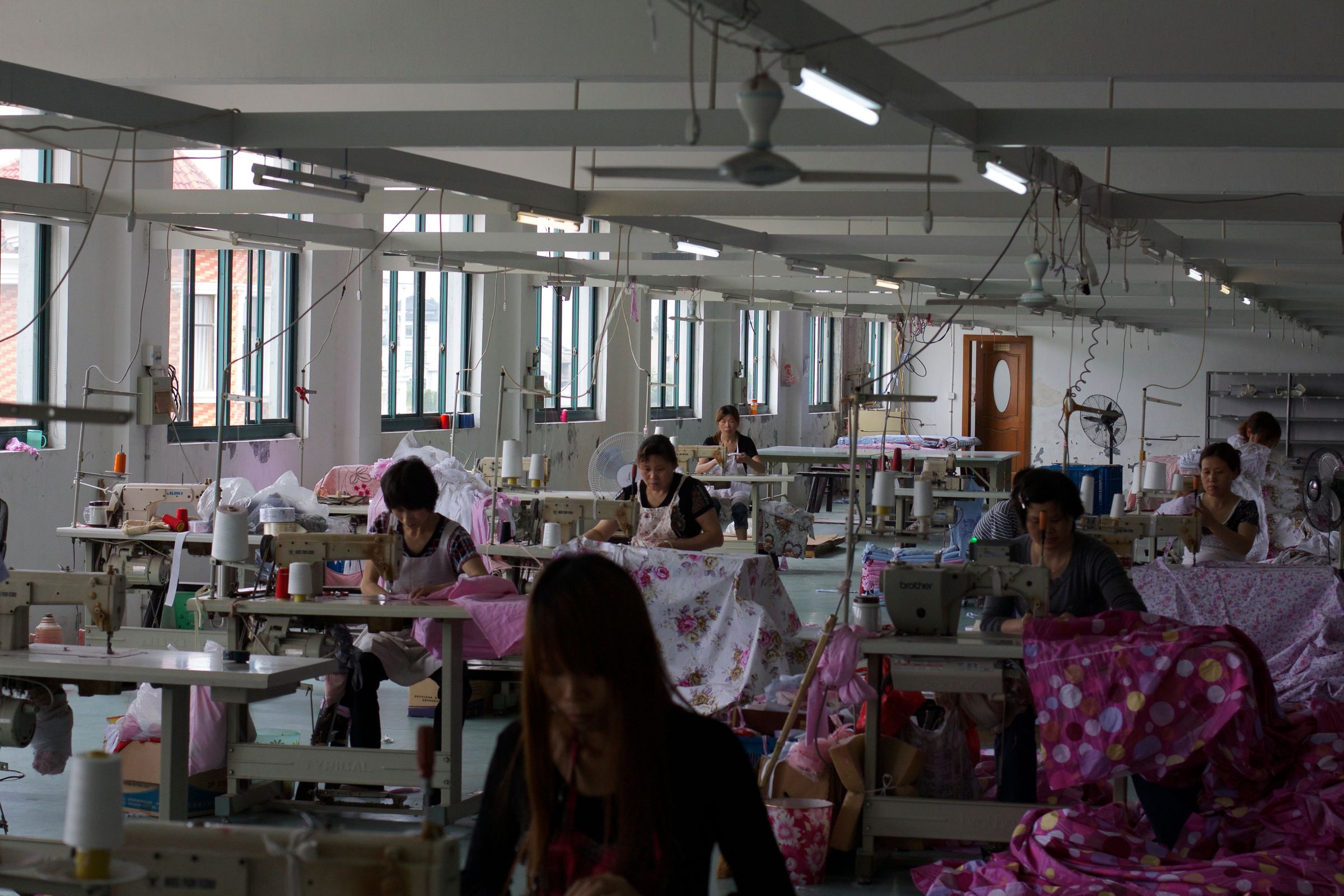 Textile workers in China — reference photograph