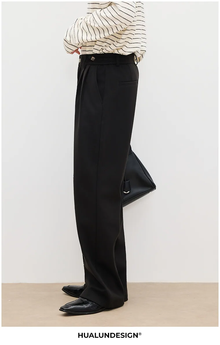 Relaxed pleated trousers — On model 2