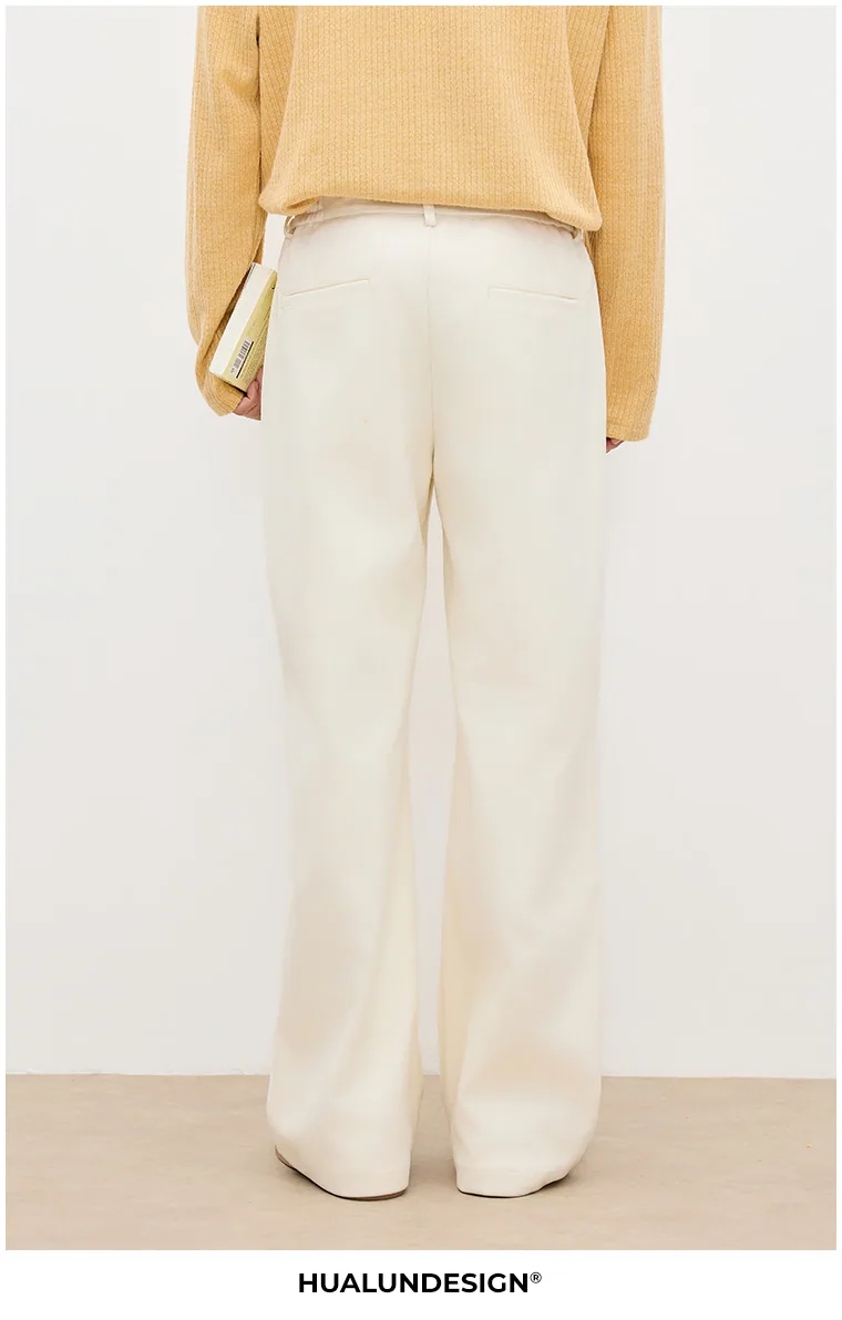 Relaxed pleated trousers — On model 3